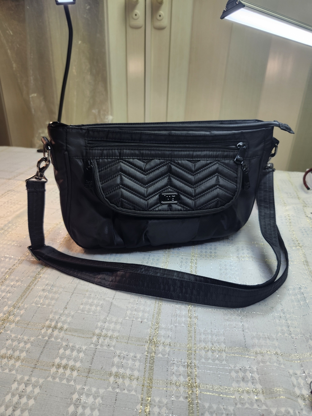 Lug MAMBO Quilted Black Crossbody Bag with Front Zip Pocket